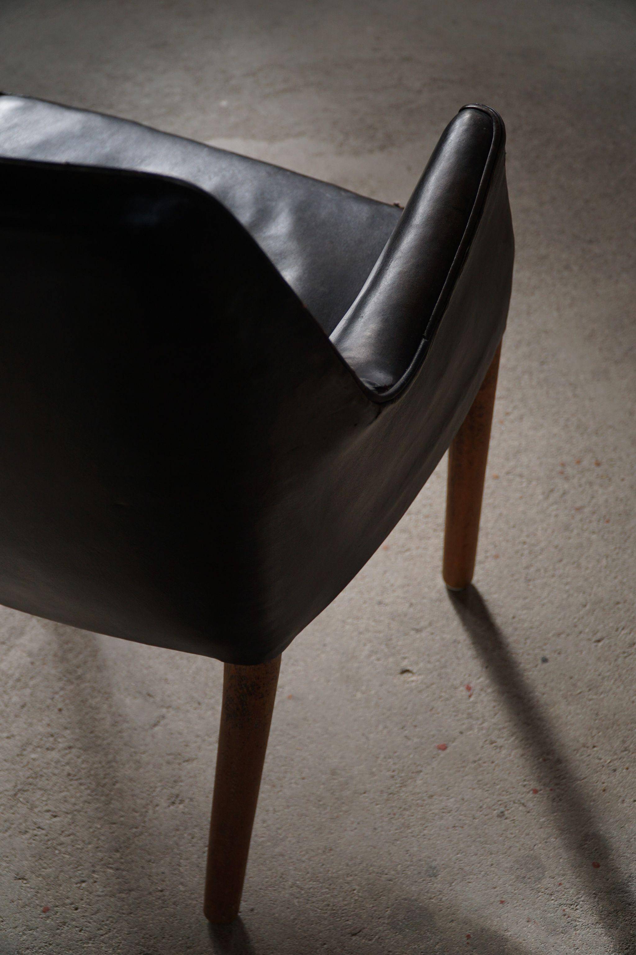 Fauteuil Danemark Moderne par Nanna Ditzel en chêne et cuir patiné, années 1950