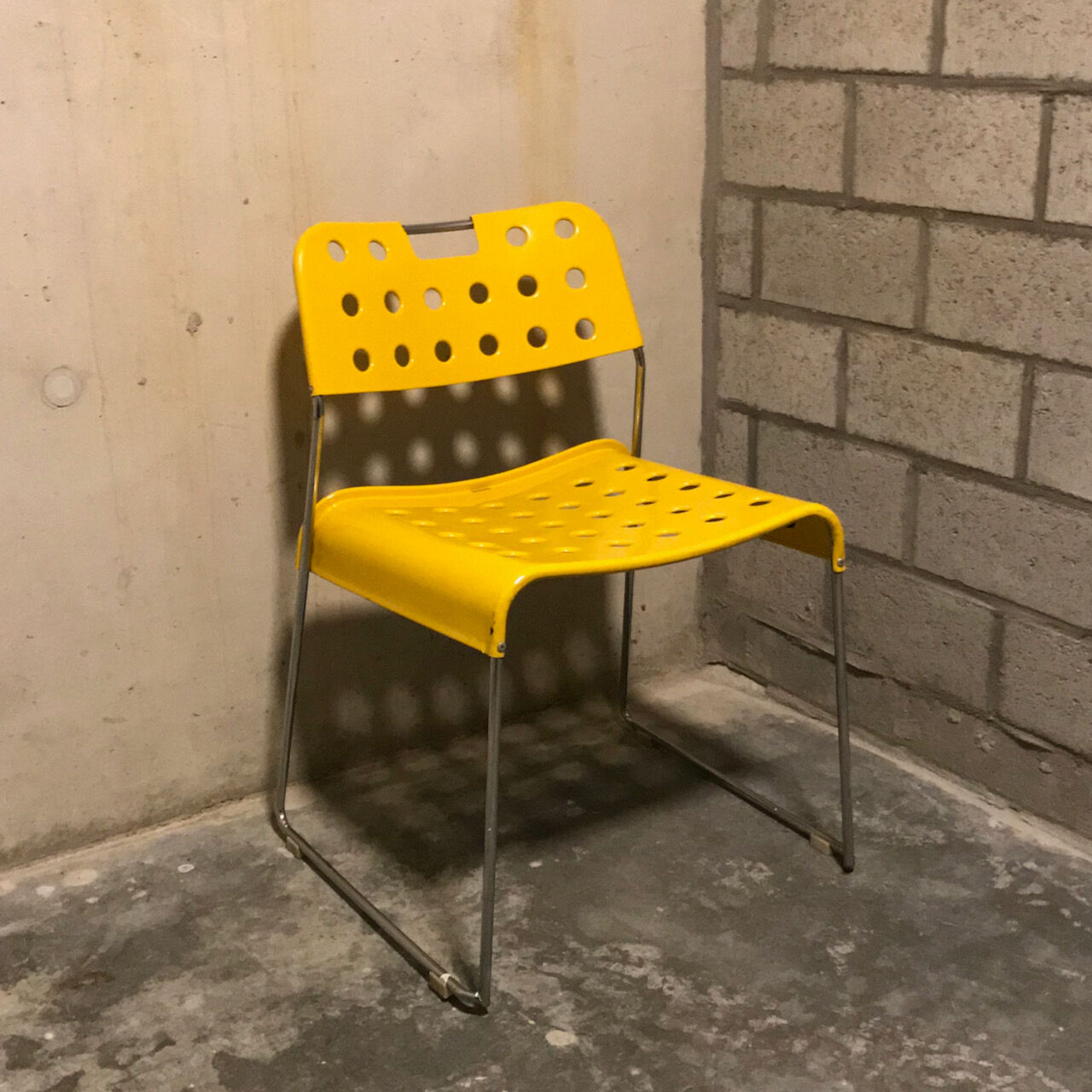 Set of 4 yellow Omstak chairs, Rodney Kinsman