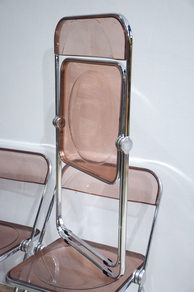Set of eight pink Plia chairs by Giancarlo Piretti for Castelli