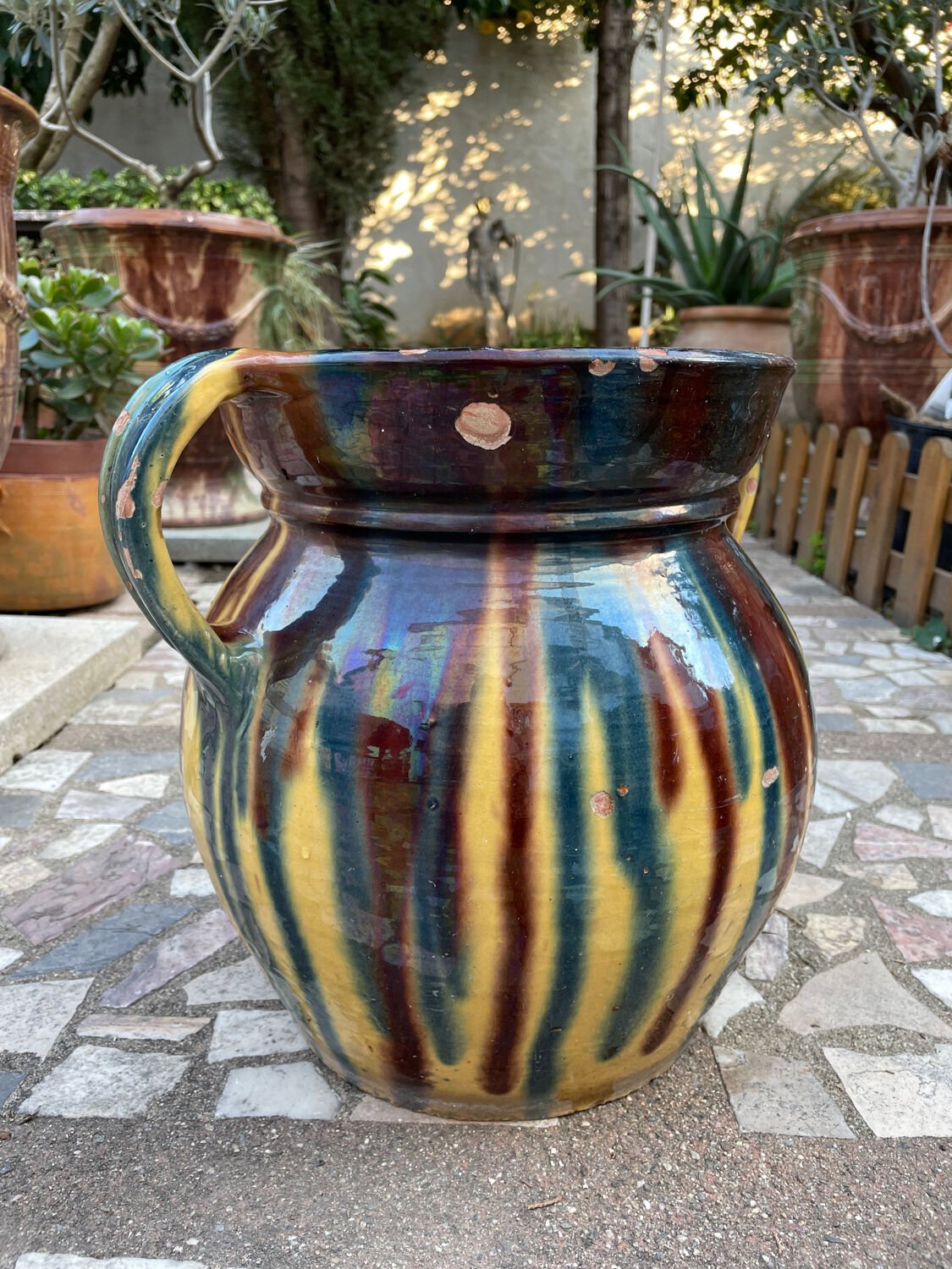 Old flower jar with two glazed earth handles