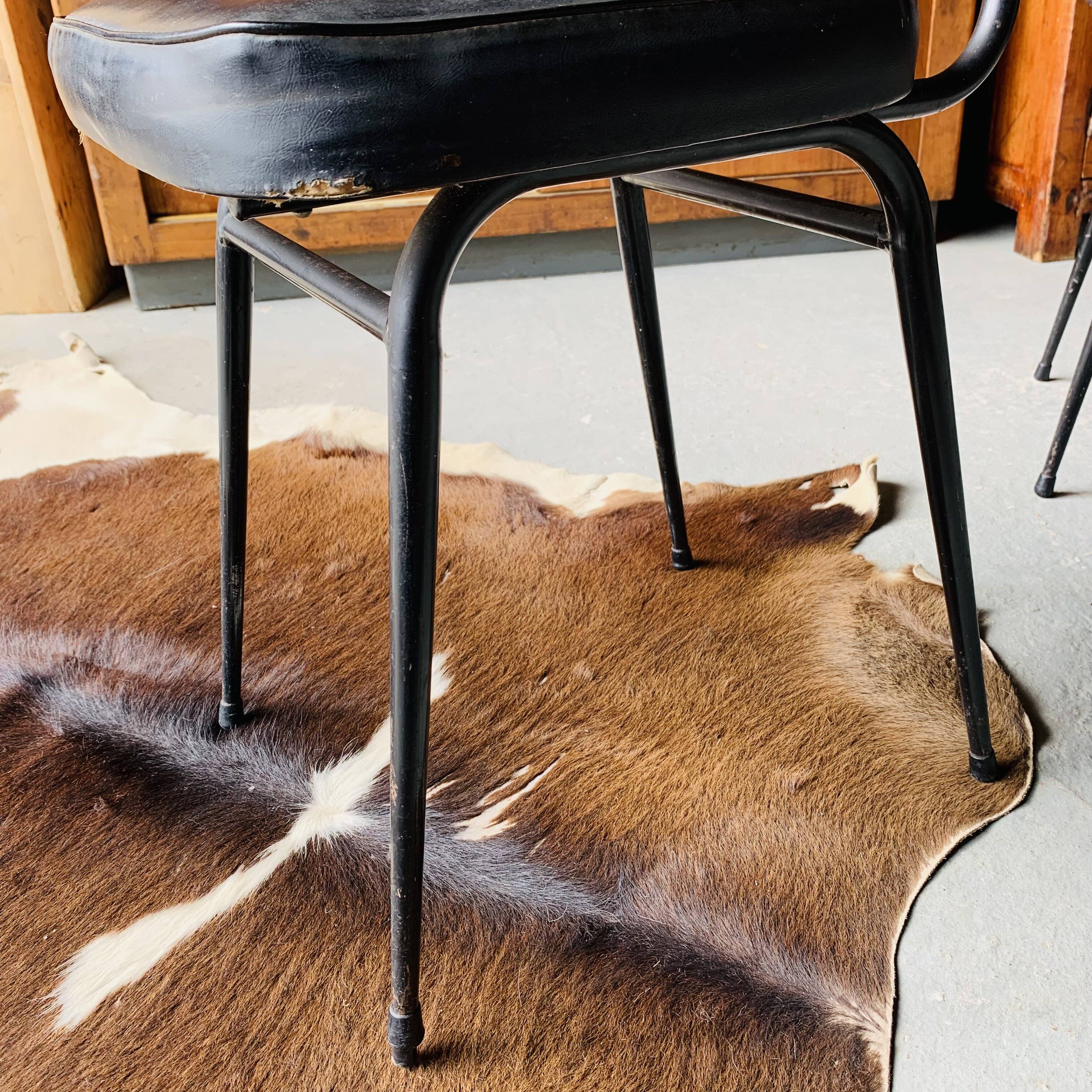 Pair of vintage black skai chairs