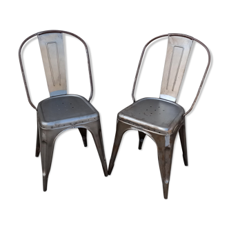 Pair of grey metal chairs