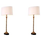 Pair of table lamps, patinated brass finish and black granite base, beautiful quality and sought-after style.