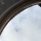Round mirror plexiglass smoked gilac 1970 brown 40 cm