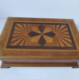 Branded wooden box decorated with suns