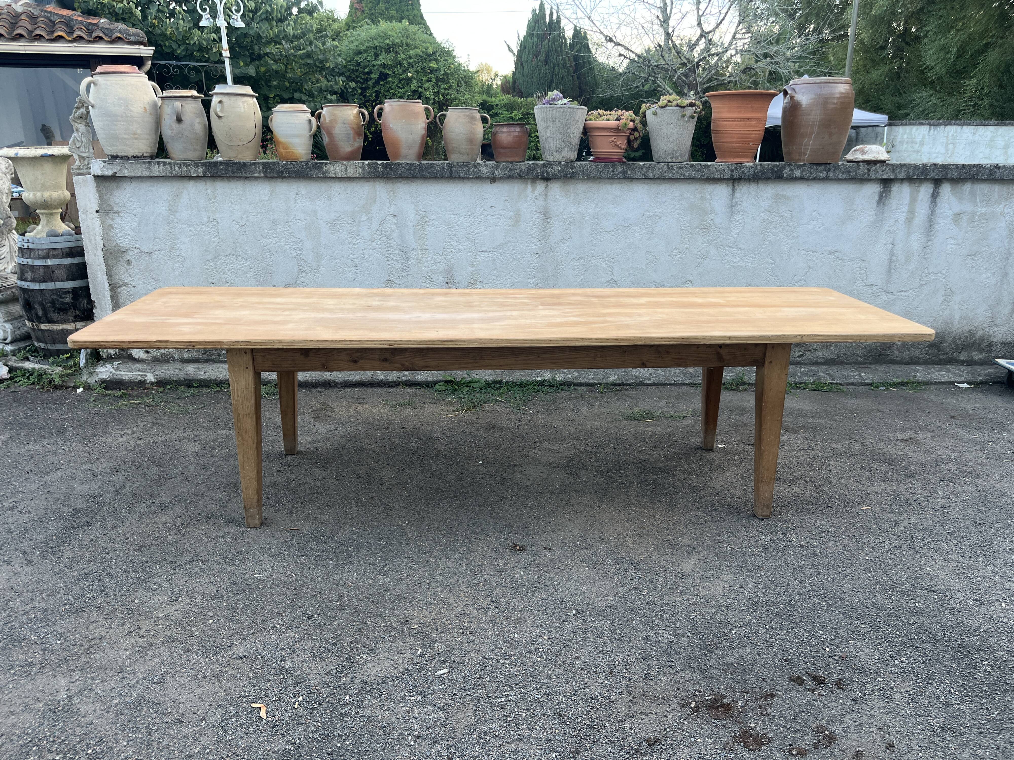 Large table 3 metres, tapered wooden legs, sanded top.