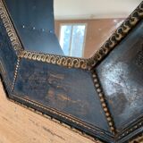 old mirror of octagonal shape.