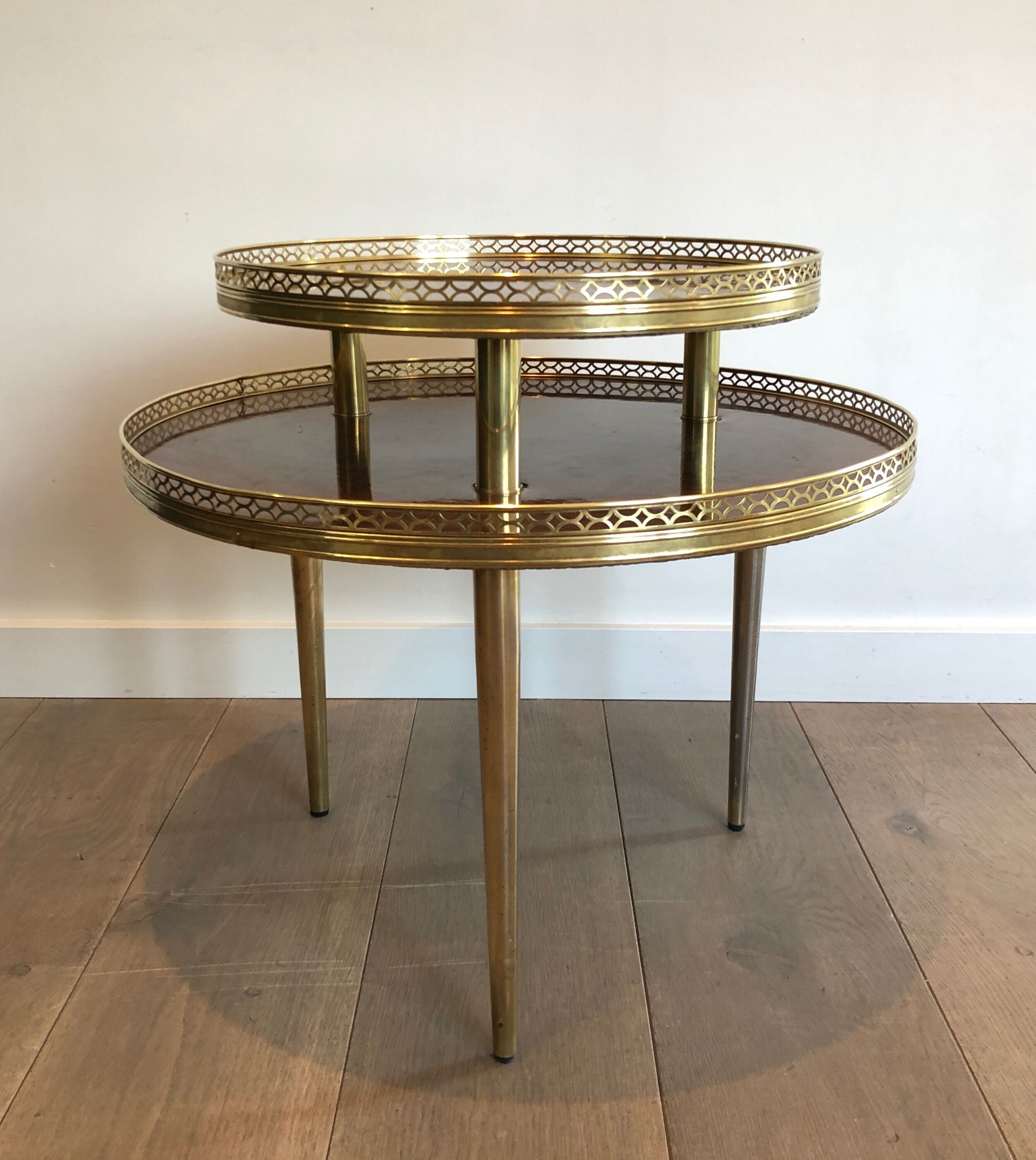 Neoclassical style tripod pedestal in mahogany, brass