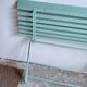 Former folding garden bench with wooden and metal slats