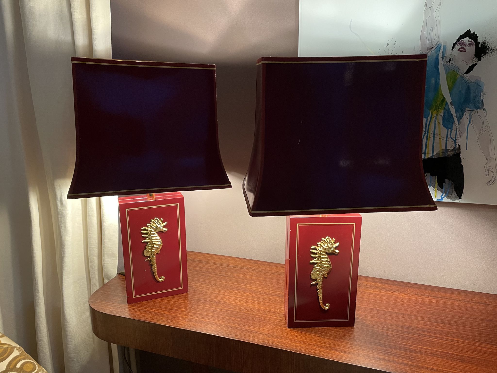 Pair of table lamps in Bordeaux lacquered wood and brass seahorse
