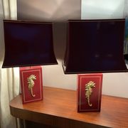 Pair of table lamps in Bordeaux lacquered wood and brass seahorse