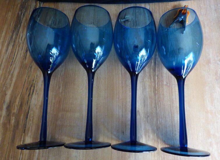 4 large vintage blue wine glasses.