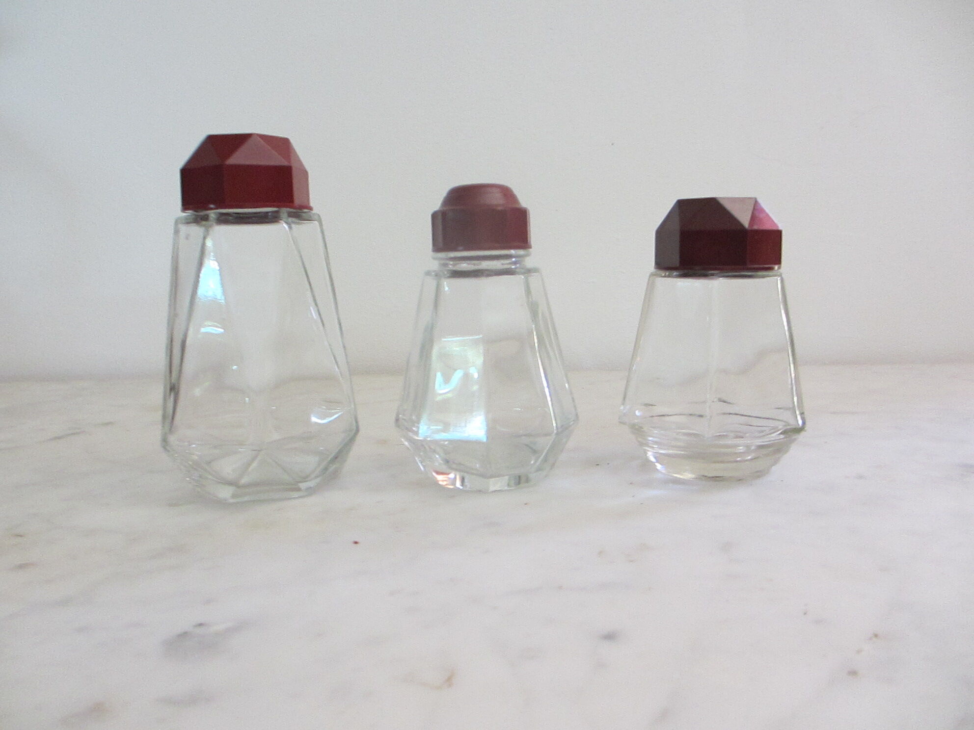 3 glass sprinklers or sugar bowls