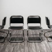 Ensemble de 4 chaises à bascule en acier chromé design années 80 vintage moderne.