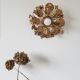 Golden metal flower sconces