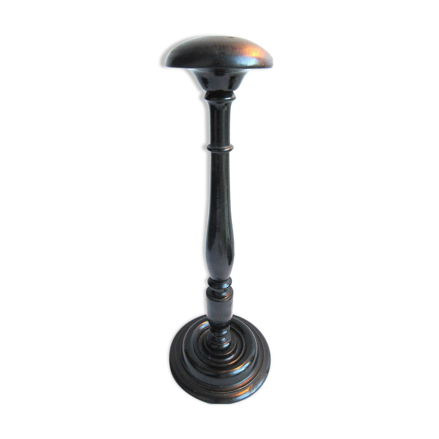 Former wooden hat holder turned blackened Napoleon III