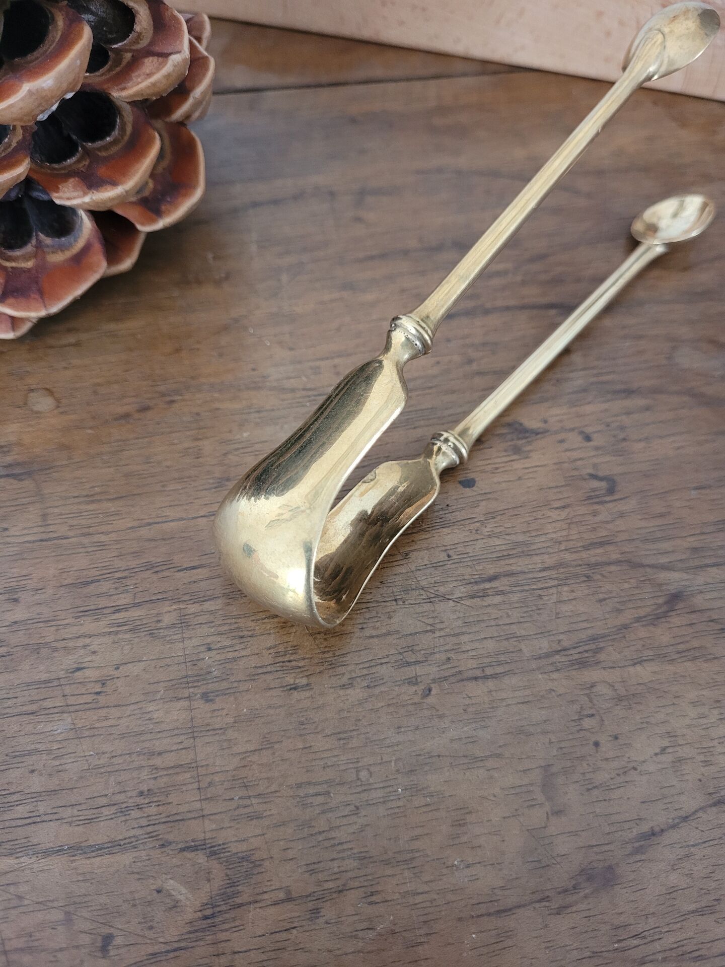 Golden metal sugar tongs