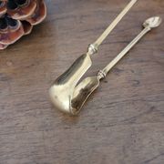 Golden metal sugar tongs