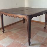 Expandable oak farm table. Late 19th.