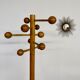 Vintage wooden coat stand with modernist design from the 1970s.