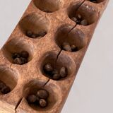 Awale Baoule game (Ivory Coast)