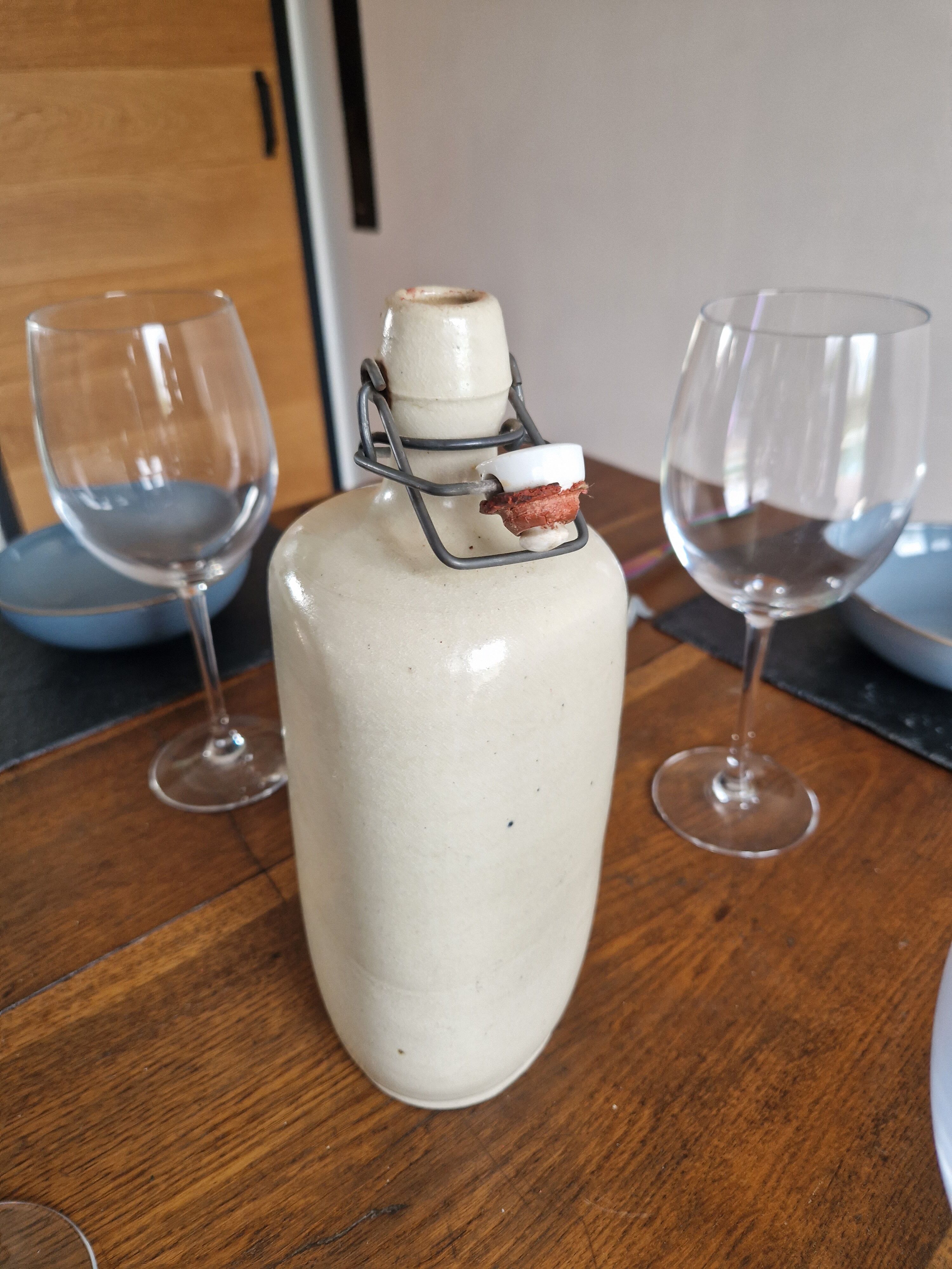 Beige stoneware hot water bottle