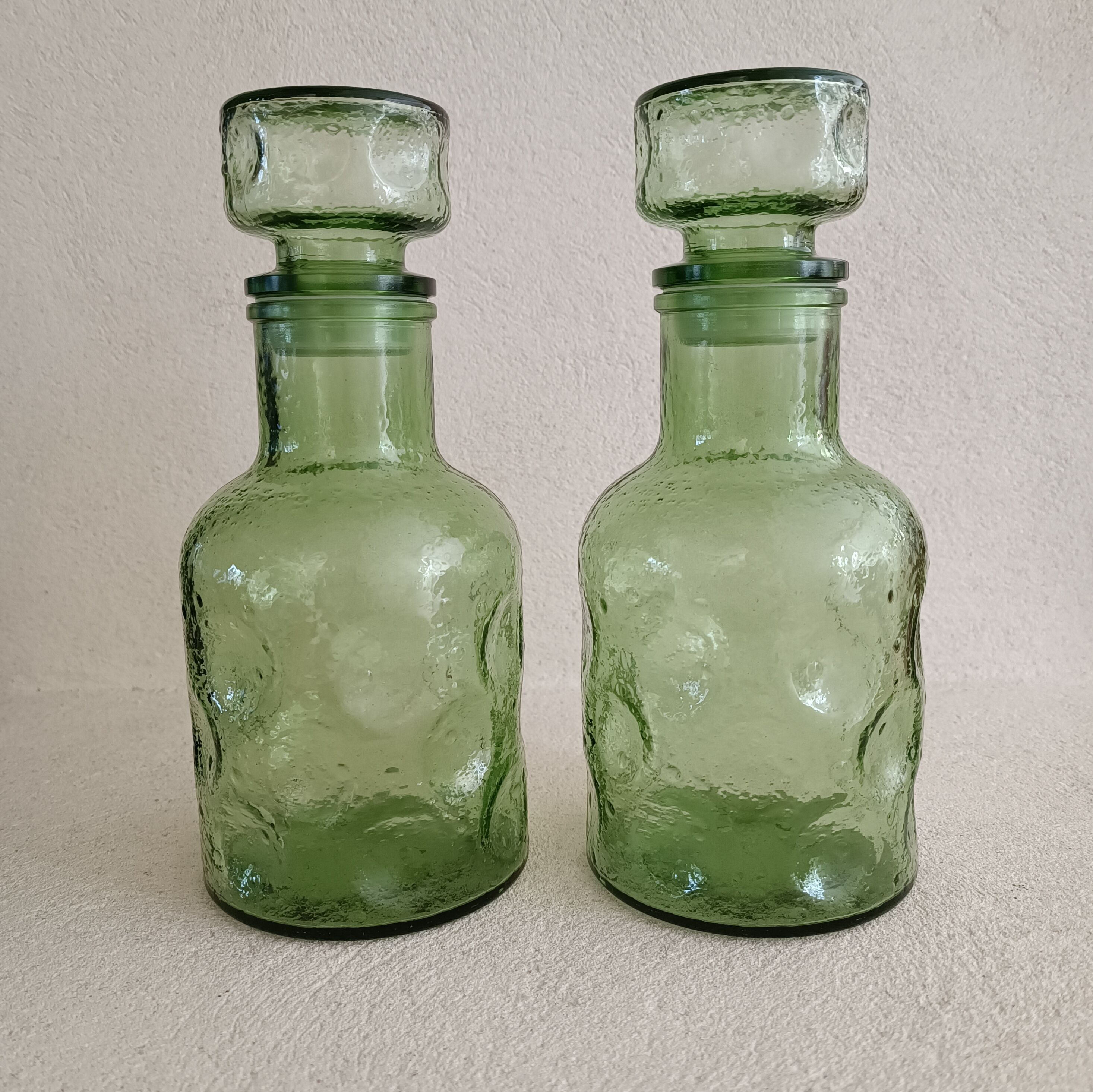 Two 1970s molded glass decanters