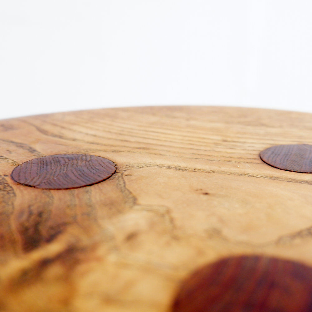 Brutalist tripod stool in solid wood, around 1960.