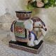 Enamelled ceramic plant holder
