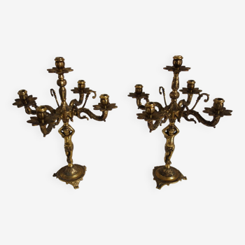 Pair of cherub candlesticks in gilded bronze early 20th century