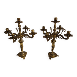 Pair of cherub candlesticks in gilded bronze early 20th century