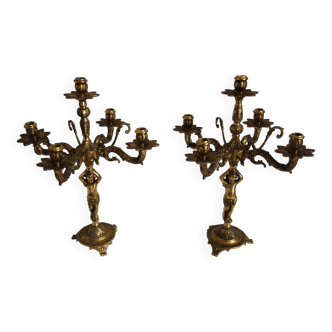 Pair of cherub candlesticks in gilded bronze early 20th century