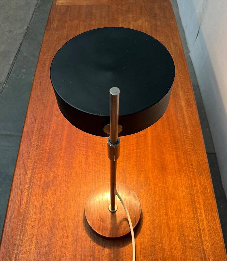 Mid-century minimalist table lamp with a teak veneer base, 1960s.