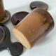 Pair of glazed stoneware cups with saucers and lids