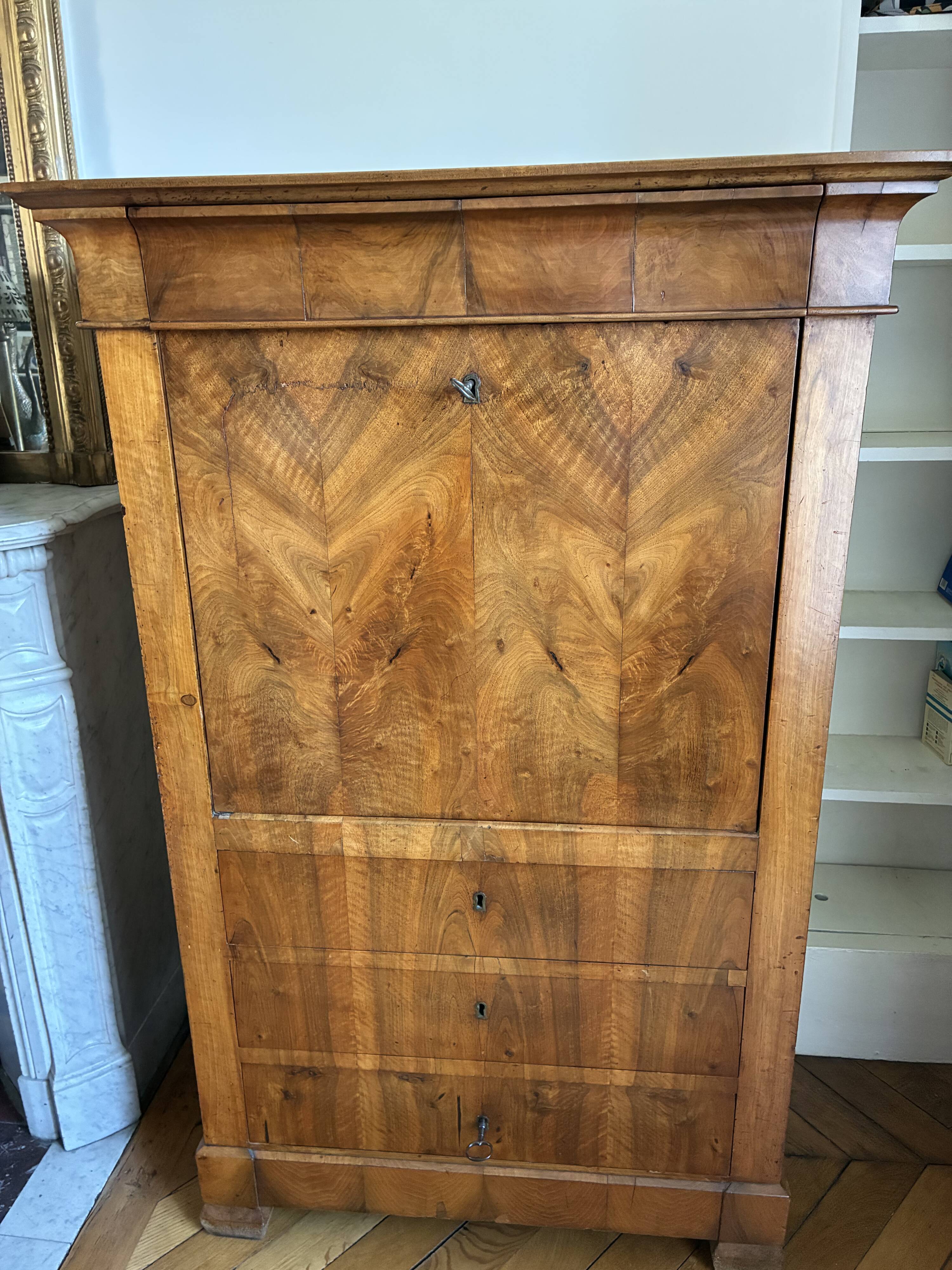 Secretary in "Louis Philippe style, Biedermeier influence" in walnut.