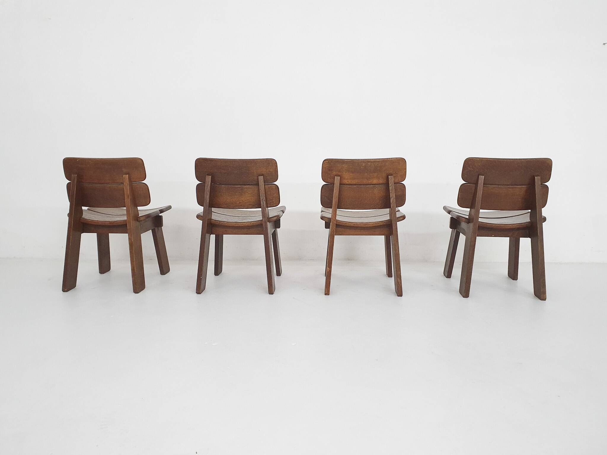 Set of four solid oak dining chairs, The Netherlands 1970's