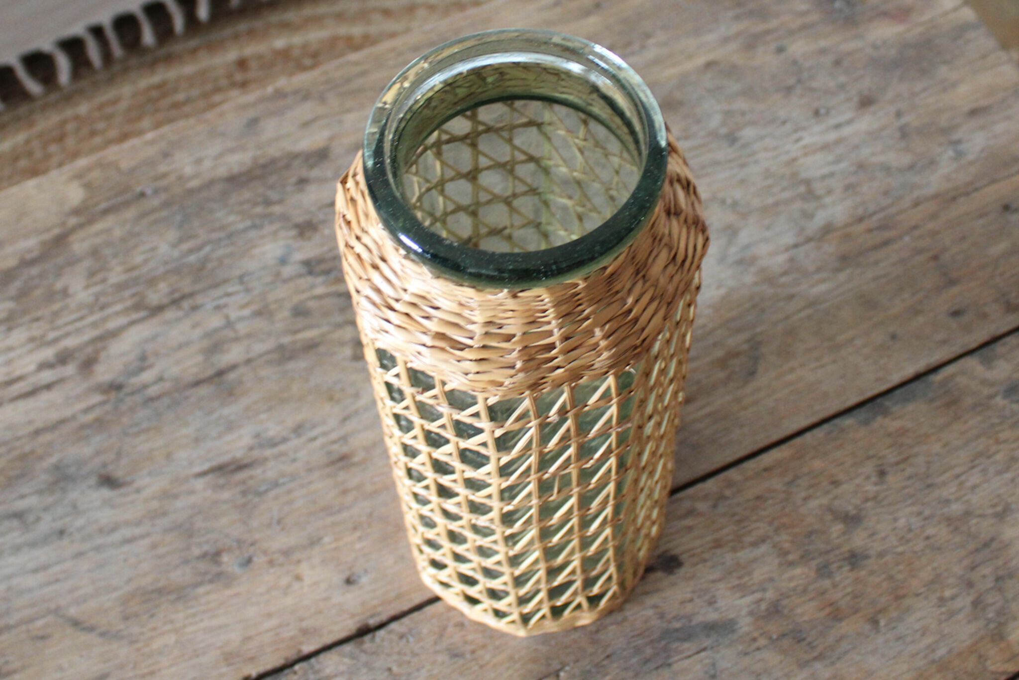 Glass and wicker vase
