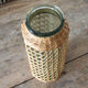 Glass and wicker vase