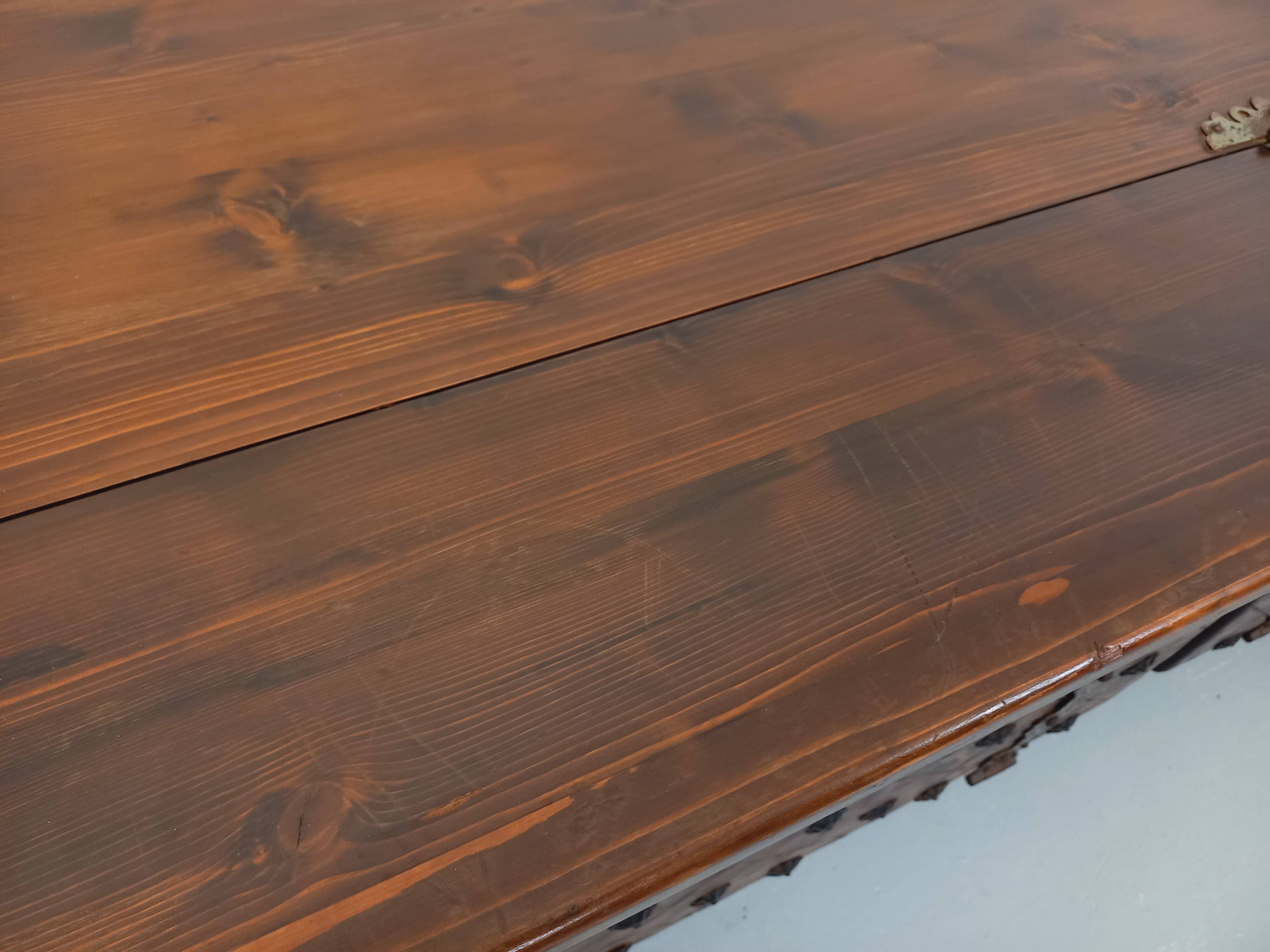 Low brutalist enfilade by Georges Robert in dark pine from the 1960s.