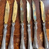 Set of knives and forks for fruits.