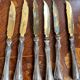 Set of knives and forks for fruits.