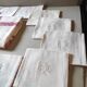 Vintage tablecloth and its 10 damassed, embroidered and monogrammed CM towels