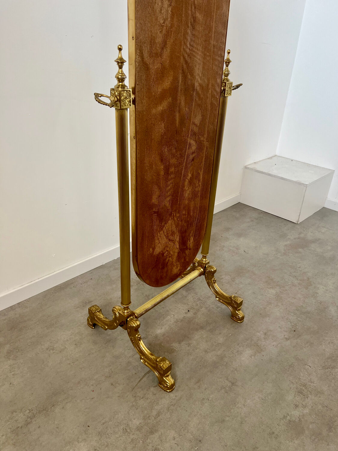 Old free-standing mirror in gilded brass in psychedelic neoclassical style Years 40 France