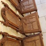 Set of 4 vintage carved cane chairs