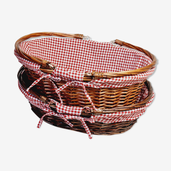 2 wicker baskets and red gingham fabrics