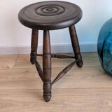 Tripod stool in turned wood, attributed to Charles Dudouyt, 20th century.