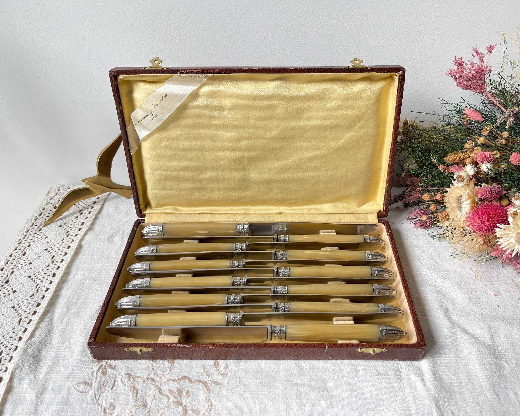 12 vintage Pradel stainless steel bakelite knives