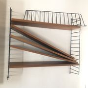 Shelf String icon of Scandinavian design designed by architect nils strinning and his wife kajsa