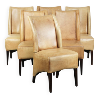 Set of six cowhide dining chairs with a comfortable seat and high back