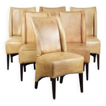 Set of six cowhide dining chairs with a comfortable seat and high back